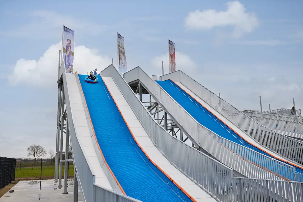 The Modi Funtower with steep blue slides on a steel structure